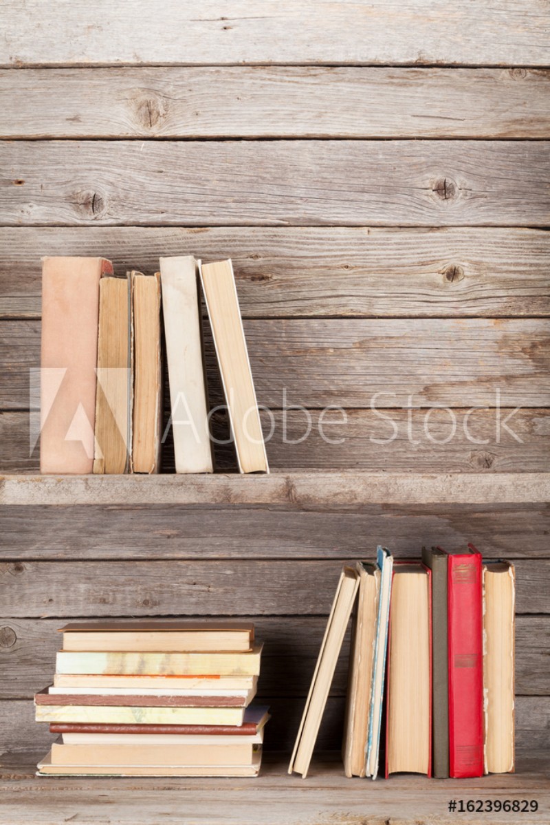 Bild på Old books on a wooden shelf